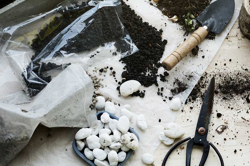 soil stones on a wooden table - brent